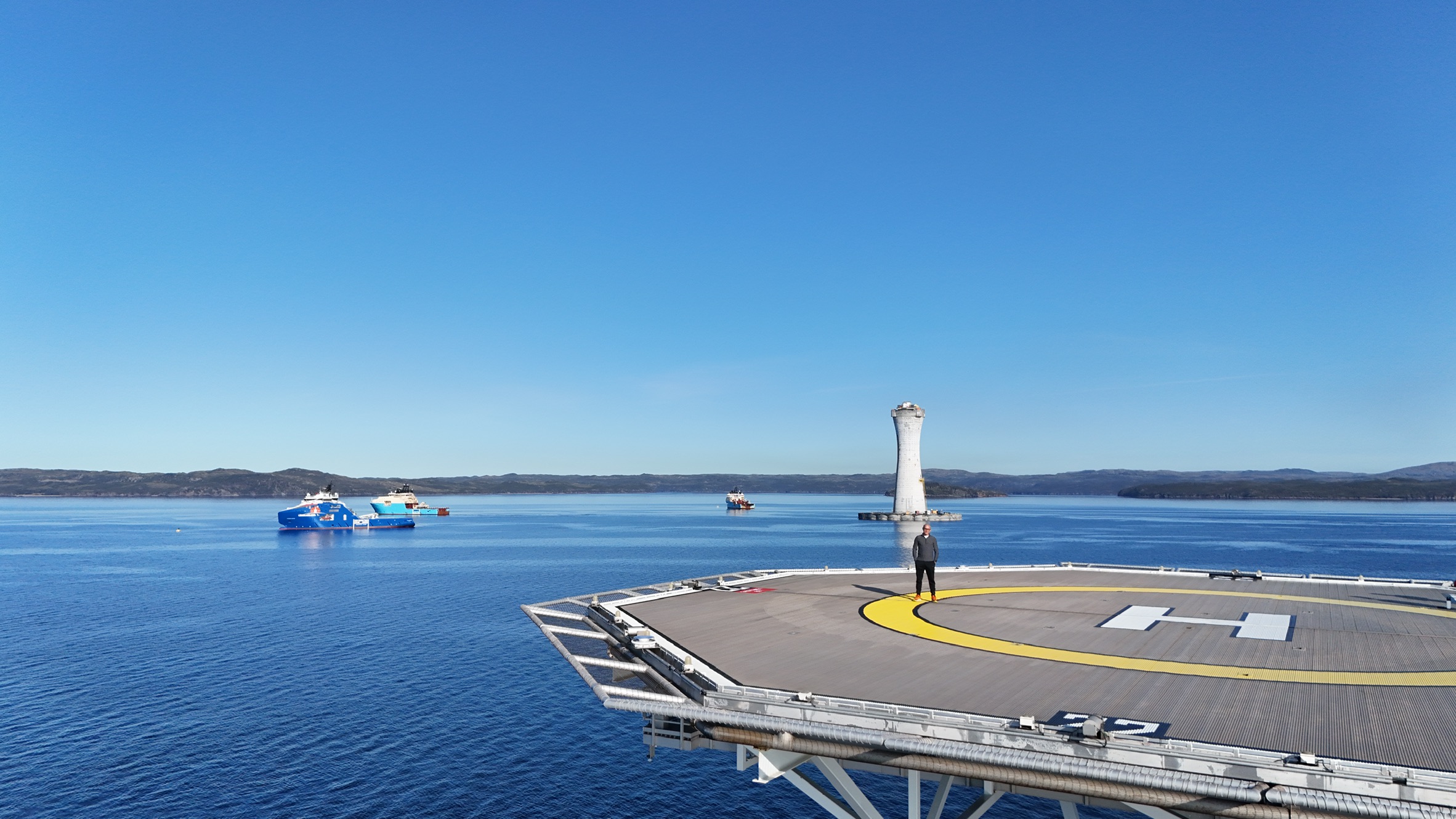 Standing on the West White Rose CGS helipad during offshore installation, June 2025